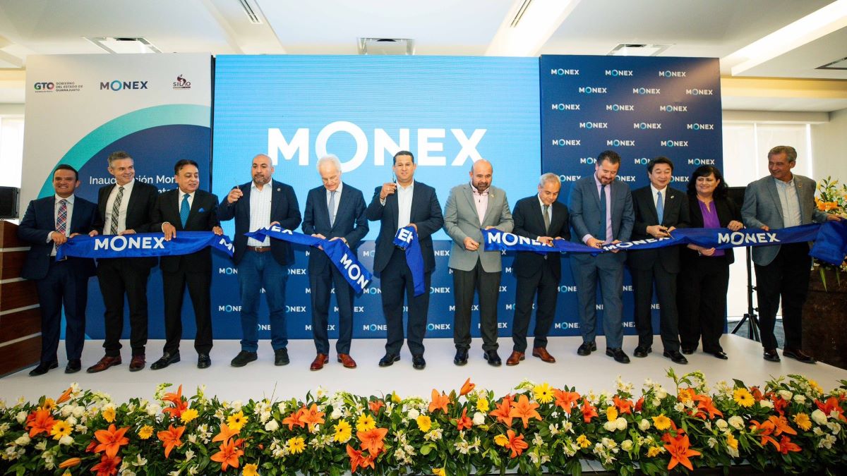 Ribbon-cutting at a Monex corporate event